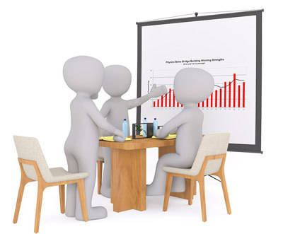 Human-like figures in a meeting discuss a chart.